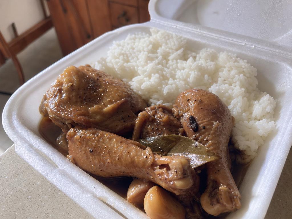 Filipino chicken adobo with steamed rice at Little Kitchen